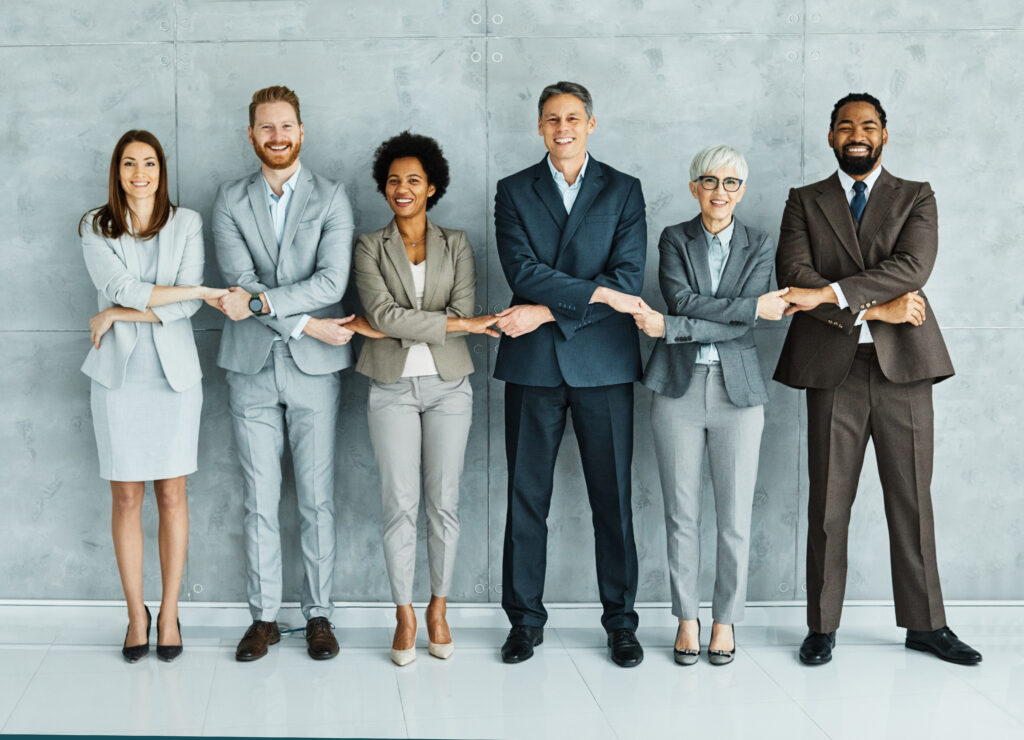 A group of businesspeople laying a solid foundation for business